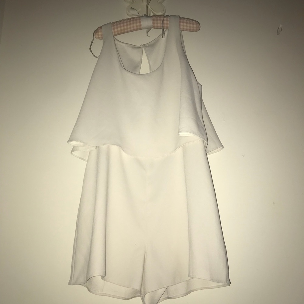 Cream colored, urban outfitters romper , one size